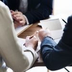 Facing Workplace Retaliation? How a Lawyer Can Help You Fight Back Business people investing on startup buiness