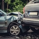What Evidence Is Crucial for Winning Your Car Accident Case? Close up smached cars on a road.