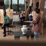 Asset Protection for Creative Business Owners: Secure Your Studio and Intellectual Property Painter teacher showing model for drawing course explaining illustration technique