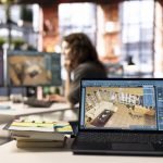 The Role of Design in Enhancing the User Experience in Public Spaces Woman uses architectural software on her PC to create a detailed 3D render