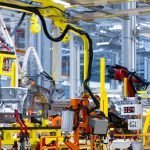 How to Identify High-Performance Bearings When Shopping Online: A Technical Buyer's Checklist robot arm holds the detail of car. Car manufacturing plant
